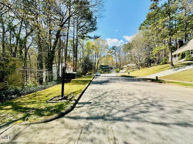 6208 Rushingbrook Drive Raleigh, NC 27612 - Photo 10 of 11 Private cul-de-sac location in popular Raleigh neighborhood close to Shelley Lake.