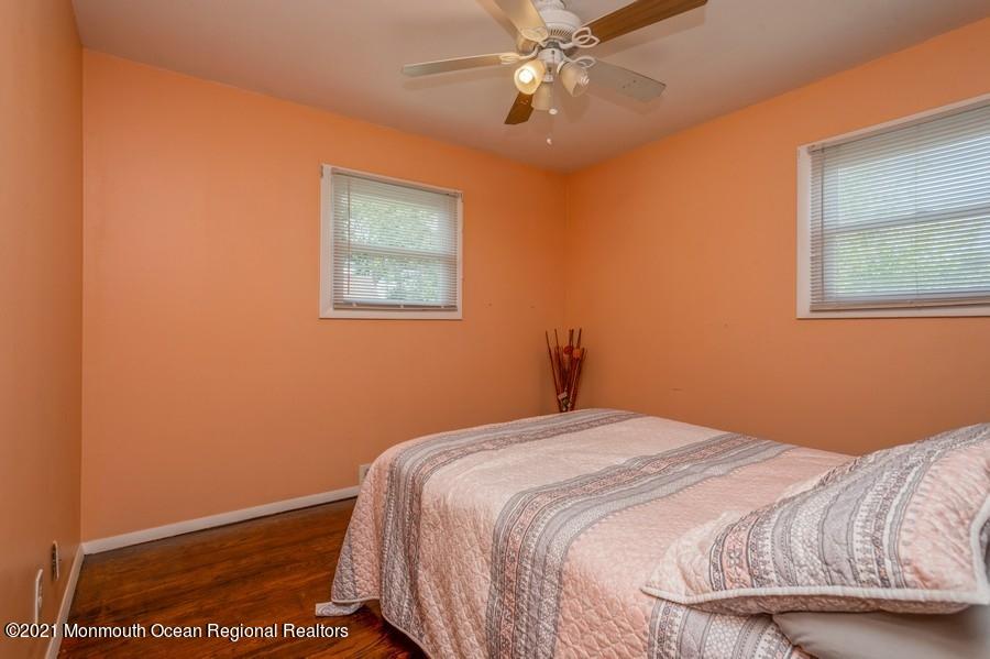 665 Aldrich Road Howell, NJ 07731 - Photo 14 of 23 a bedroom with a bed and a window