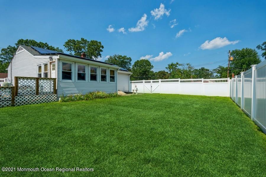 665 Aldrich Road Howell, NJ 07731 - Photo 23 of 23 a front view of a house with garden