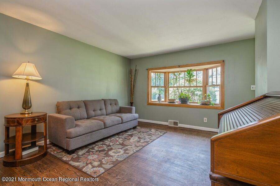 665 Aldrich Road Howell, NJ 07731 - Photo 6 of 23 a living room with furniture and a window
