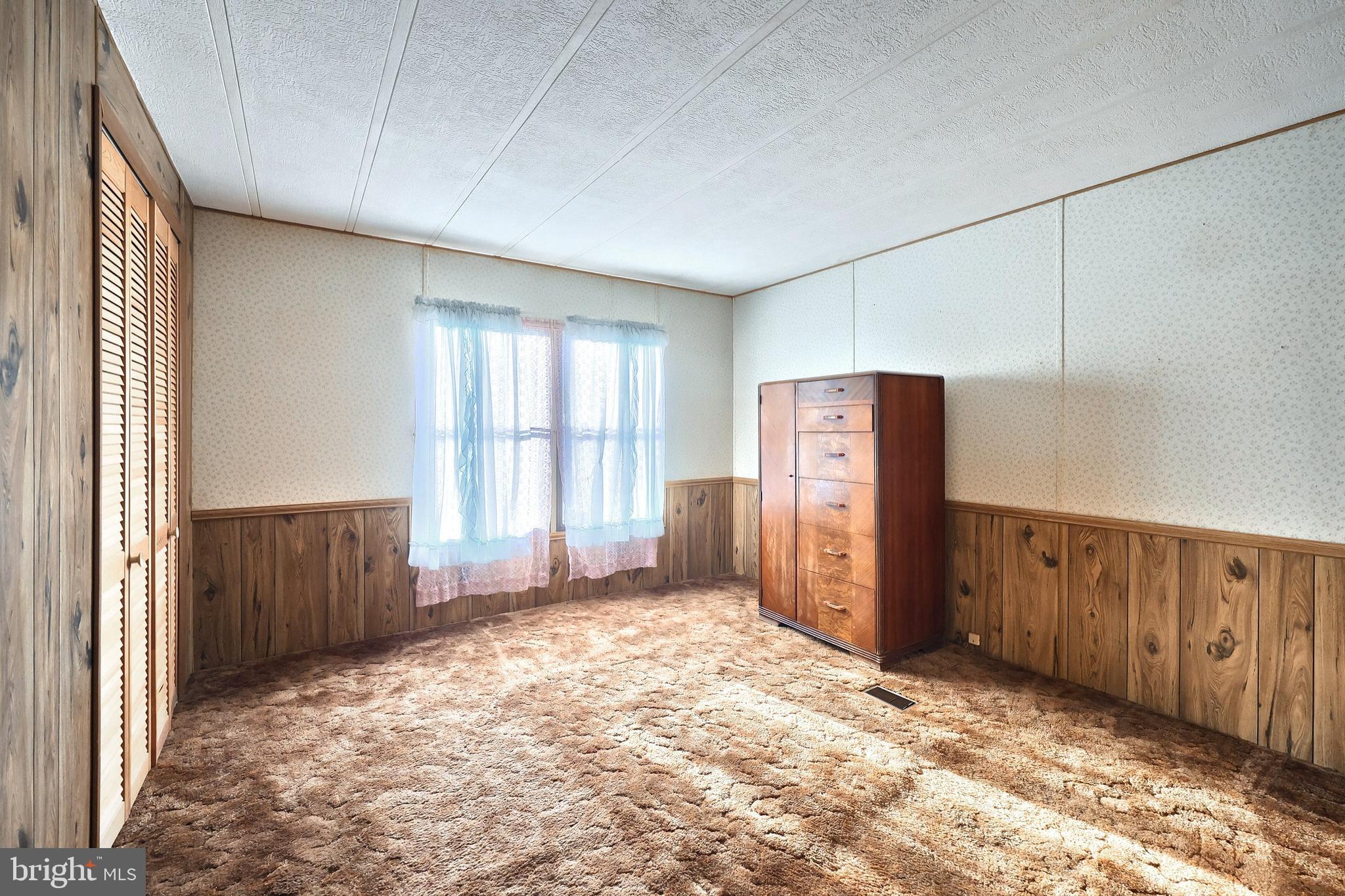 2121 Stauffer Road Seven Valleys, PA 17360 - Photo 21 of 47 a view of an empty room with a fireplace