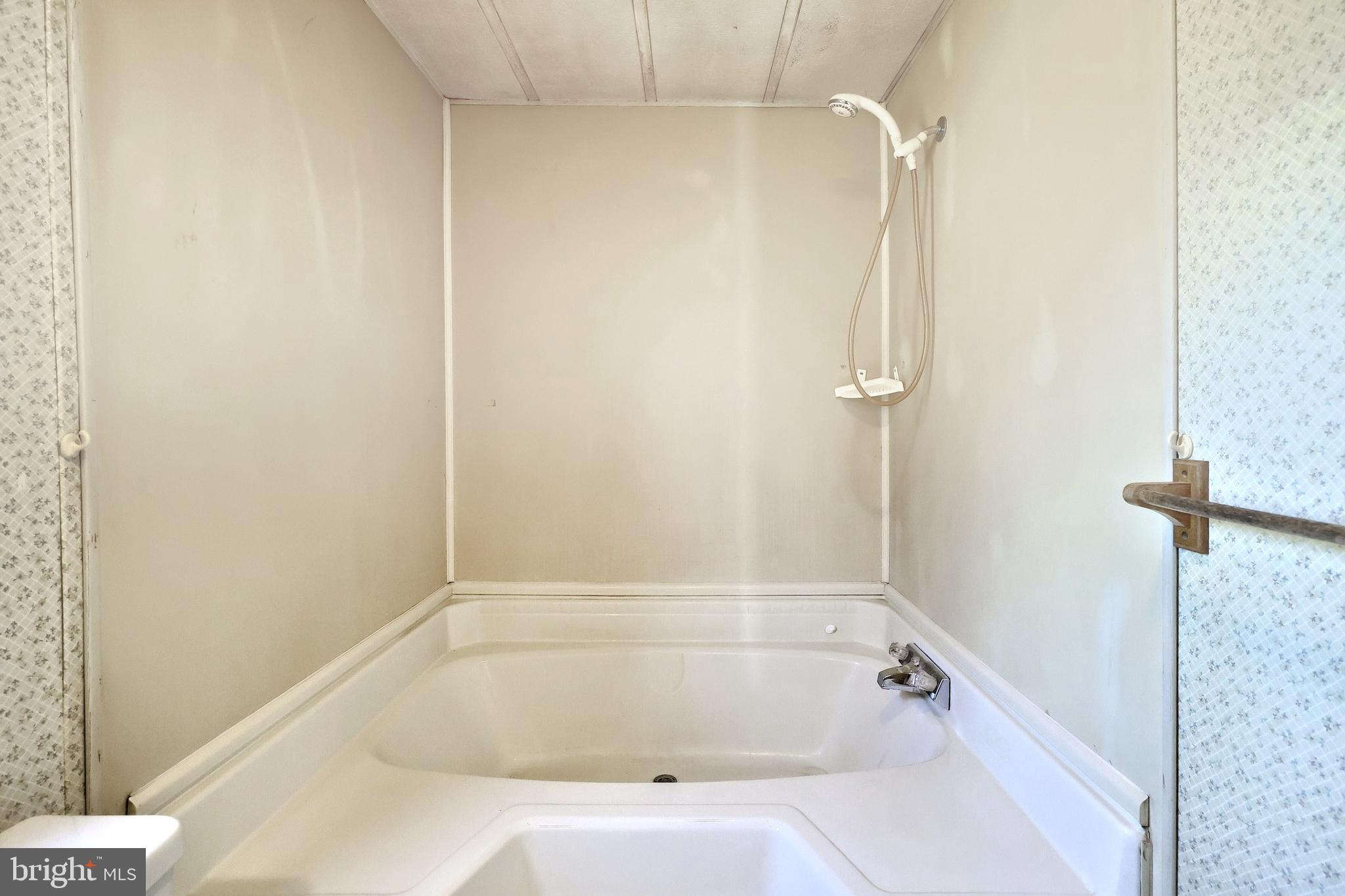 2121 Stauffer Road Seven Valleys, PA 17360 - Photo 25 of 47 a bathroom with a tub