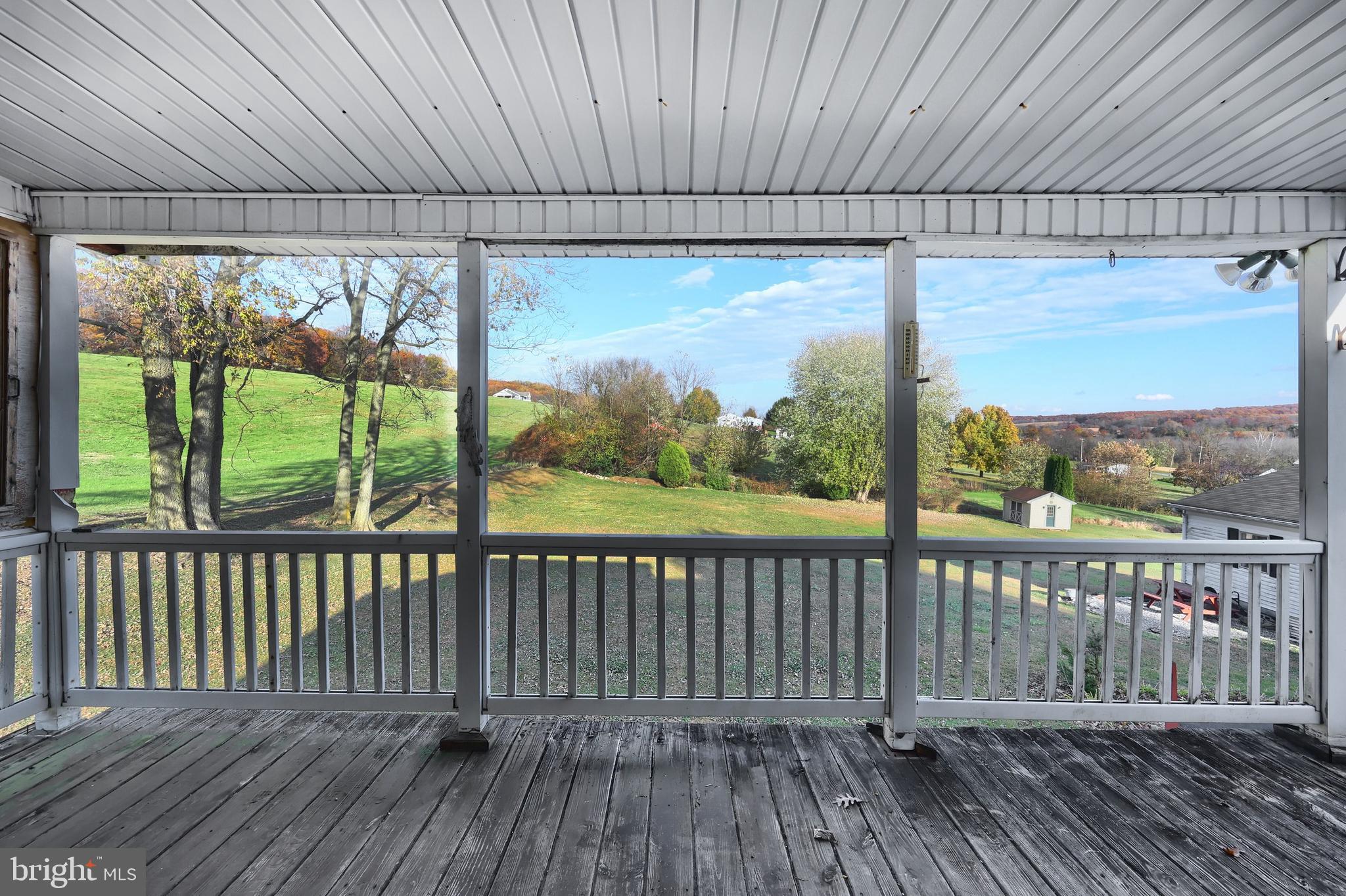 2121 Stauffer Road Seven Valleys, PA 17360 - Photo 6 of 47 a view of a roof deck with wooden floor