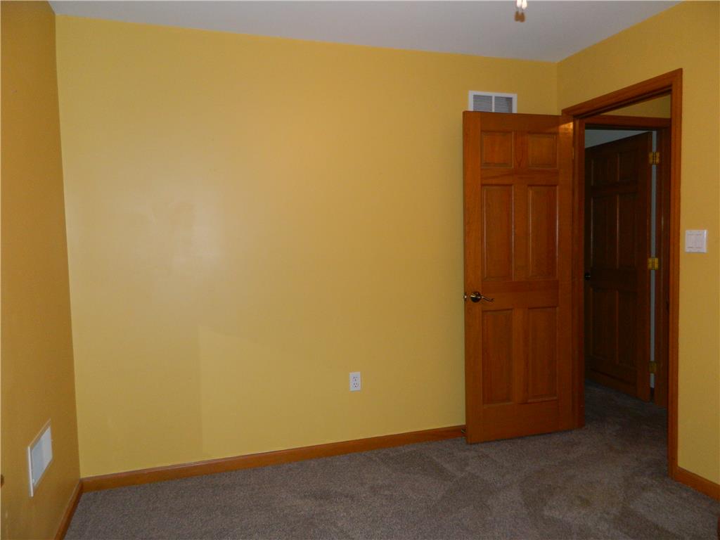 328 Pin Oak Road Stroudsburg, PA 18360 - Photo 39 of 42 A well-maintained interior space features wood doors and plush carpeting.