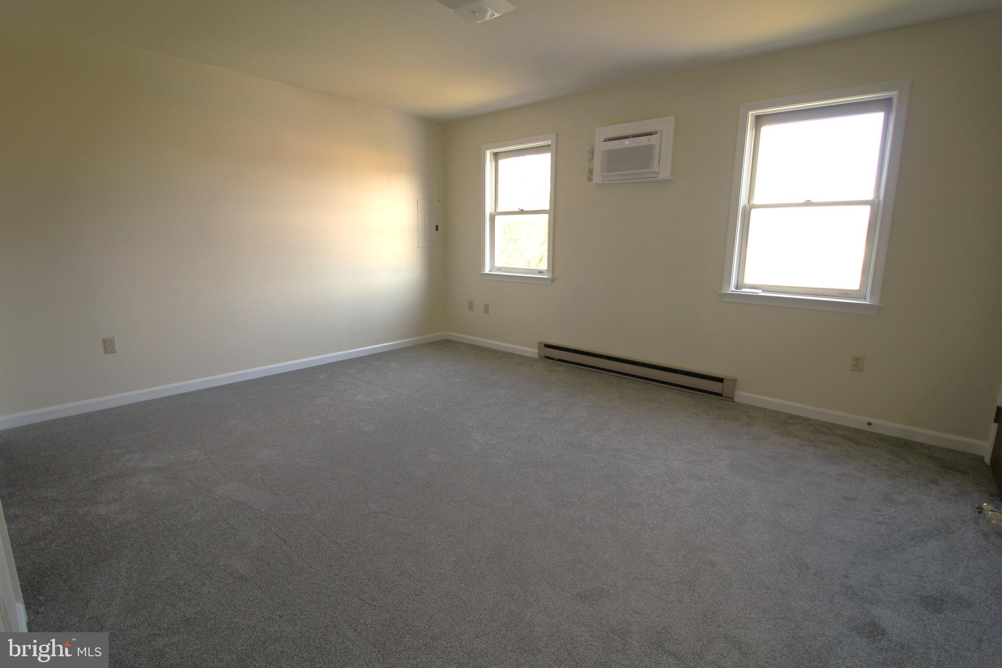 6 Cardinal Drive, Unit 8 Stevens, PA 17578 - Photo 8 of 10 an empty room with windows