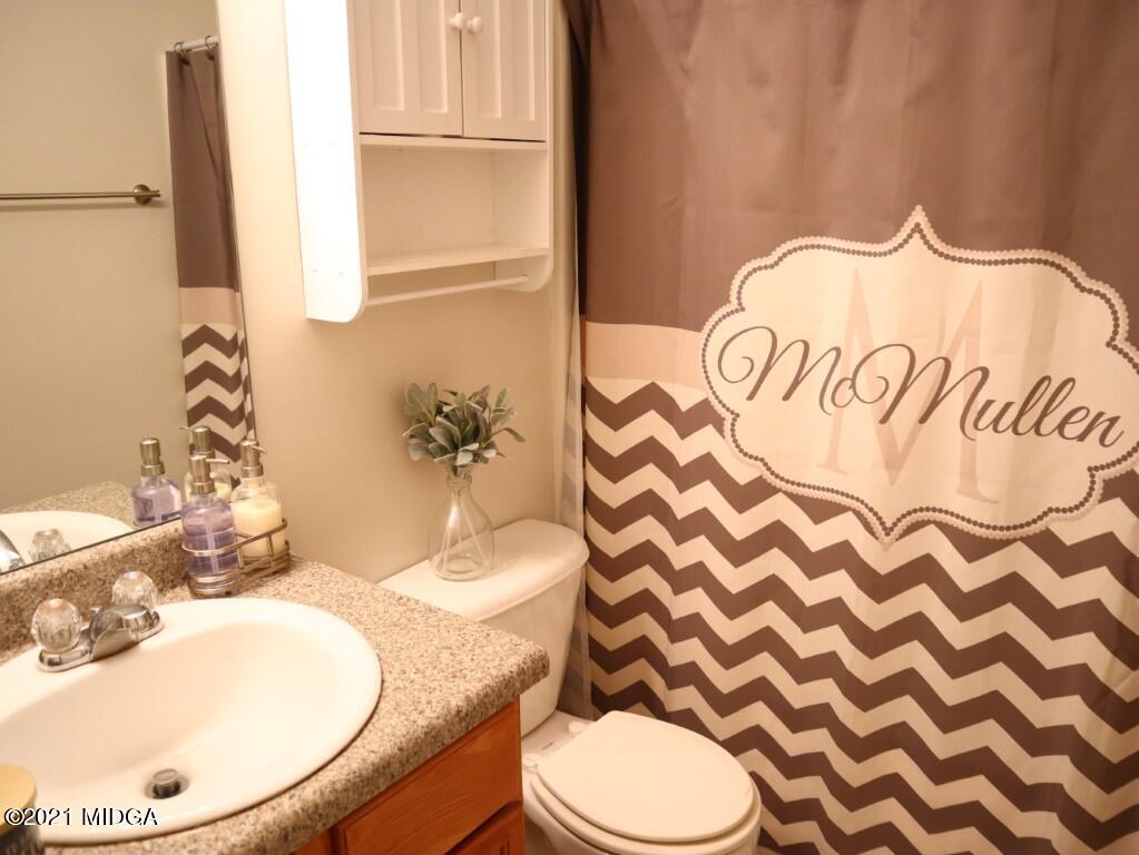 204 Autumn Ridge Court Gray, GA 31032 - Photo 16 of 20 a bathroom with a sink and a mirror