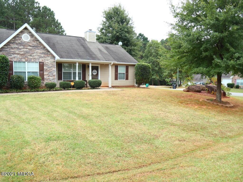 204 Autumn Ridge Court Gray, GA 31032 - Photo 20 of 20 a front view of a house with a garden