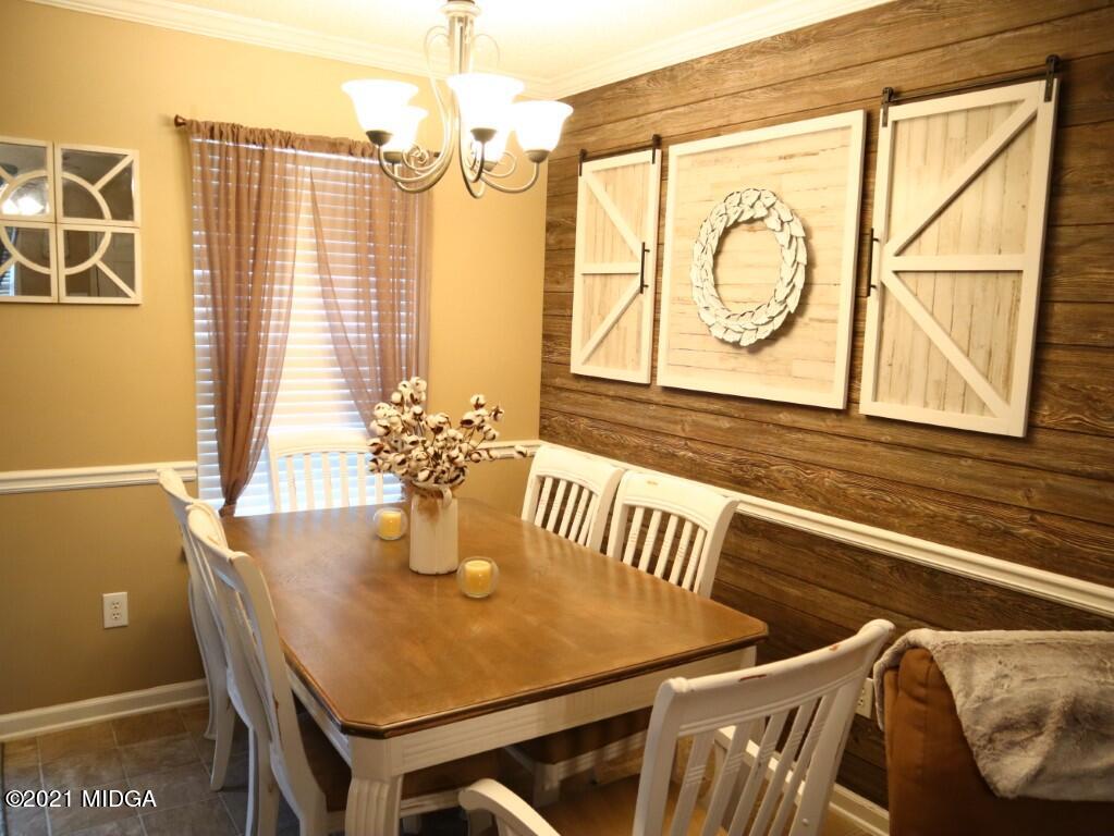 204 Autumn Ridge Court Gray, GA 31032 - Photo 9 of 20 a dining room with window