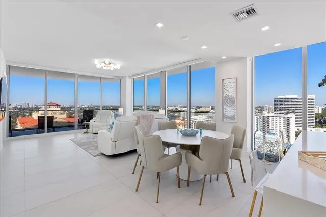 a bedroom with a large bed and a couch