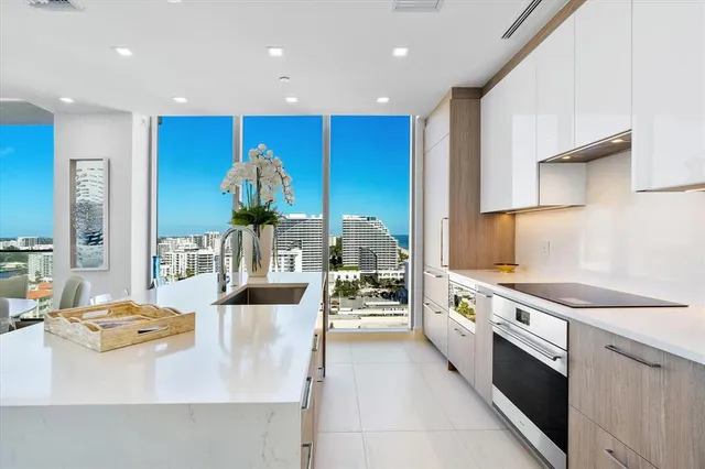 a bathroom with a window and a shower