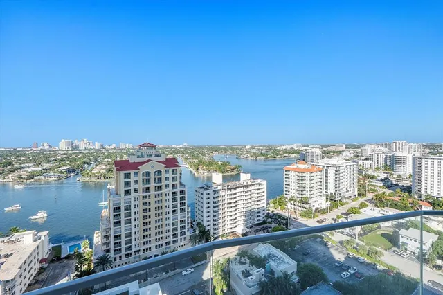 a living room with lots of furniture and white walls