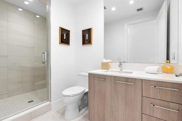 a view of a city with tall buildings