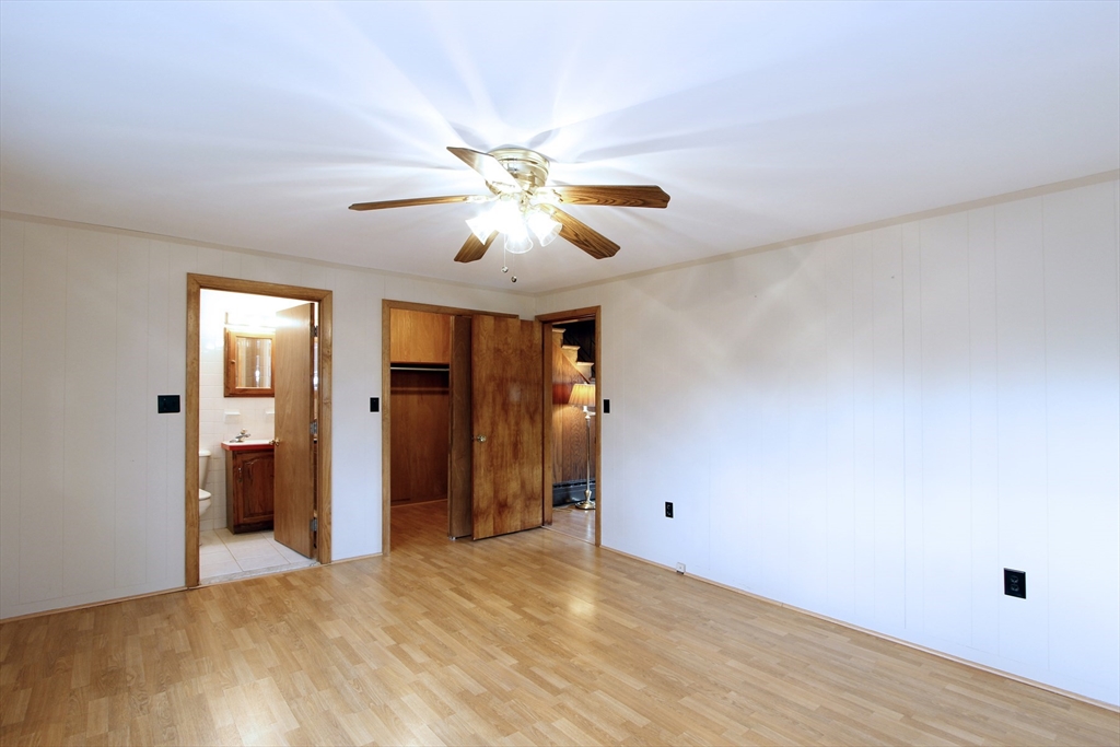 4 Van Bummel Road Bourne, MA 02532 - Photo 15 of 25 a view of a livingroom with a chandelier fan