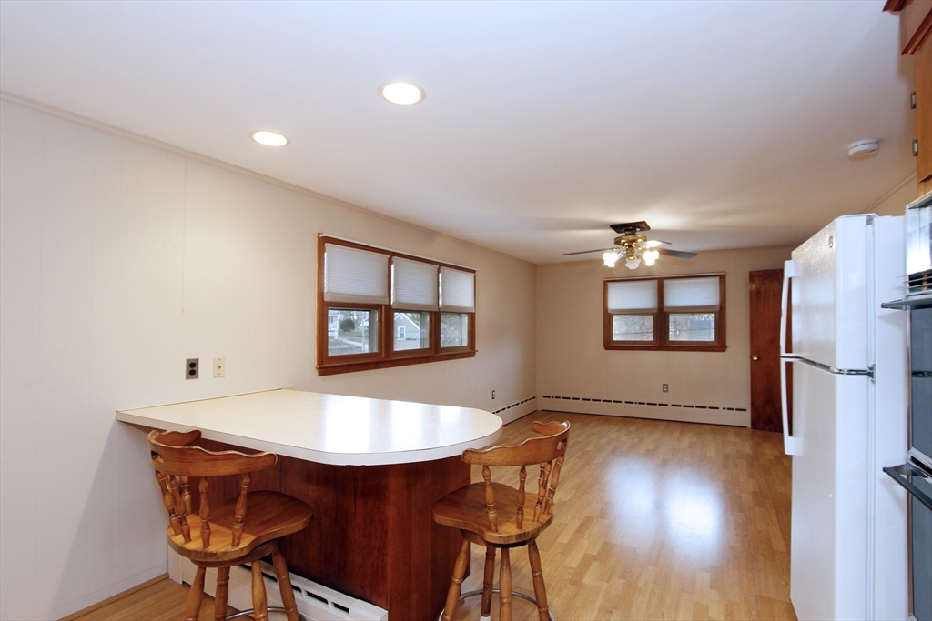 4 Van Bummel Road Bourne, MA 02532 - Photo 9 of 25 a view of a dining room with furniture and wooden floor