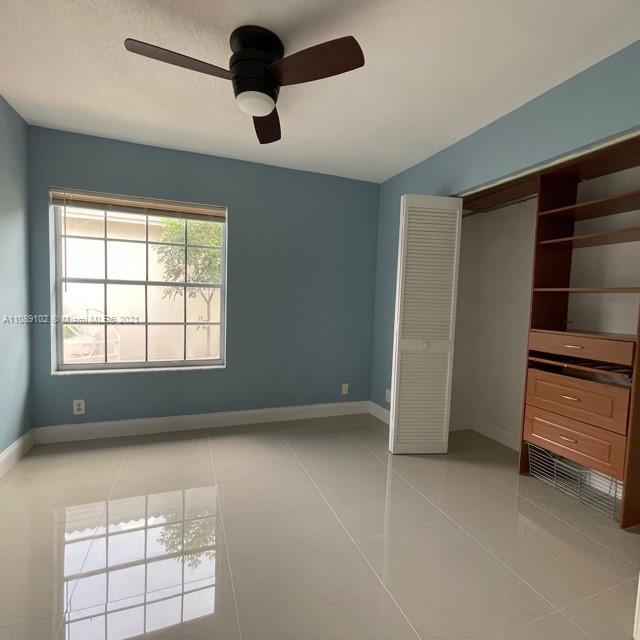 Silver Lakes Pembroke Pines, FL 33029 - Photo 16 of 19 an empty room with windows