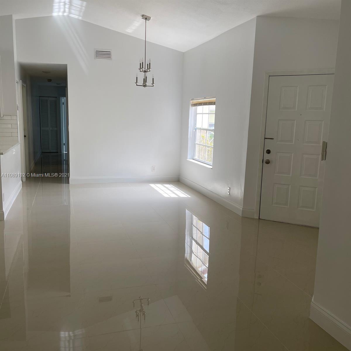 Silver Lakes Pembroke Pines, FL 33029 - Photo 6 of 19 a view of an empty room and window