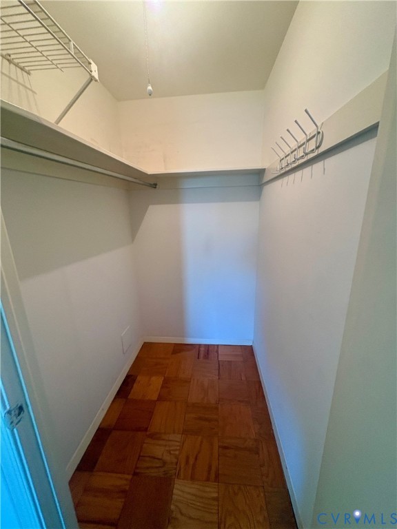 12 Snughaven Road Henrico, VA 23228 - Photo 10 of 15 Hardwood-finish flooring, built-in shelving, and a