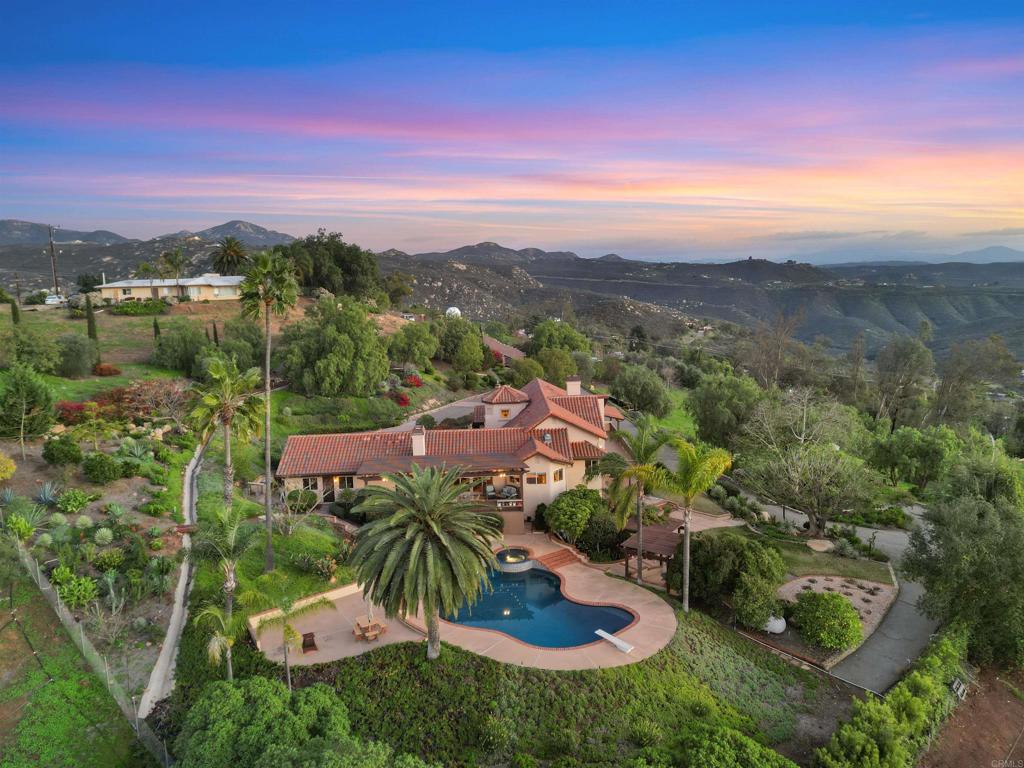 15466 Markar Road Poway, CA 92064 - Photo 2 of 69 a view of a lake with a building in the background