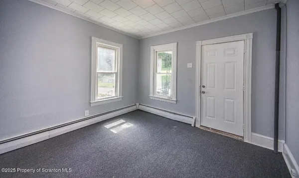 an empty room with windows