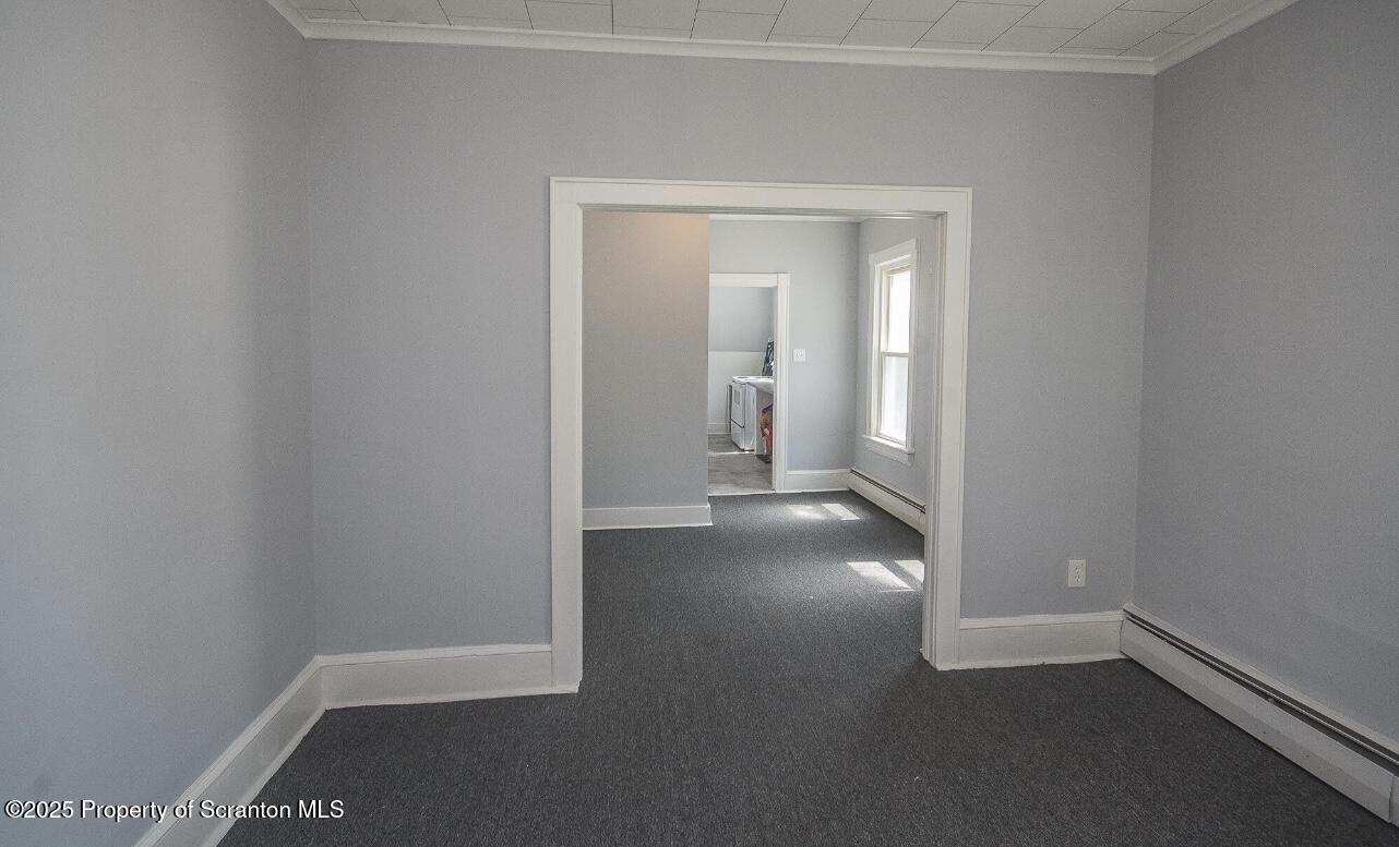 144 Jefferson Street Simpson, PA 18407 - Photo 6 of 14 wooden floor in a empty room