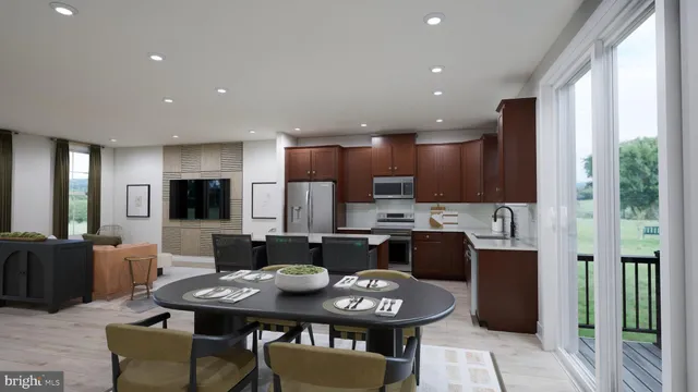 a large kitchen with a table and chairs