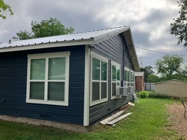 a view of outdoor space and yard from deck