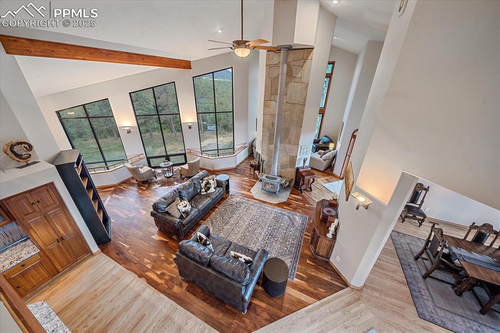 8045 Eagle Road Larkspur, CO 80118 - Photo 22 of 50 a view of a living room with furniture and large windows