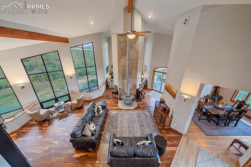 8045 Eagle Road Larkspur, CO 80118 - Photo 23 of 50 a living room with furniture and a large window