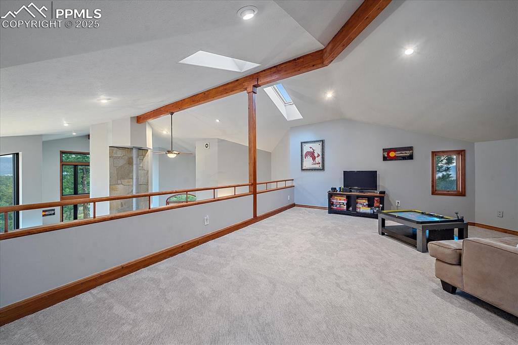 8045 Eagle Road Larkspur, CO 80118 - Photo 24 of 50 a view of a hallway with workspace