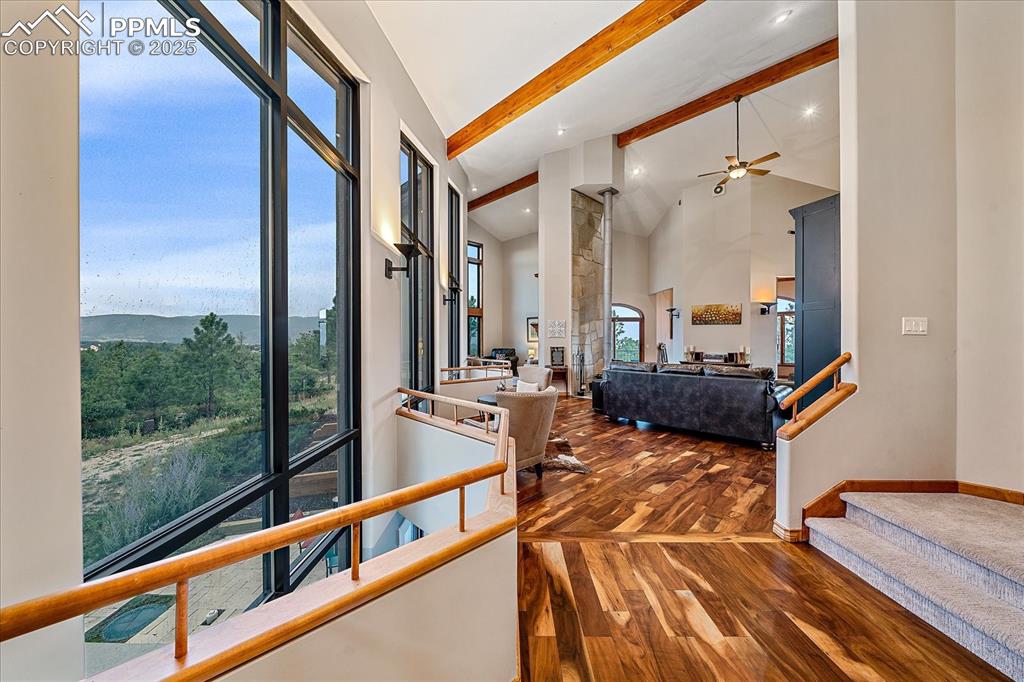 8045 Eagle Road Larkspur, CO 80118 - Photo 3 of 50 a very nice looking room with a large window and wooden floor