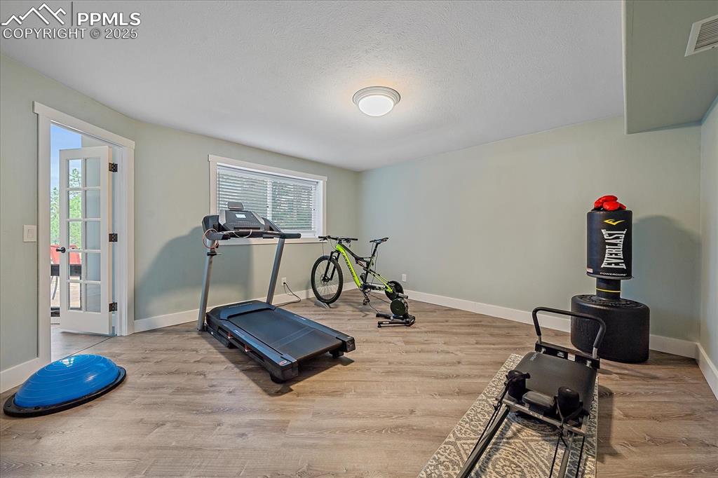 8045 Eagle Road Larkspur, CO 80118 - Photo 34 of 50 a view of a room with gym equipment