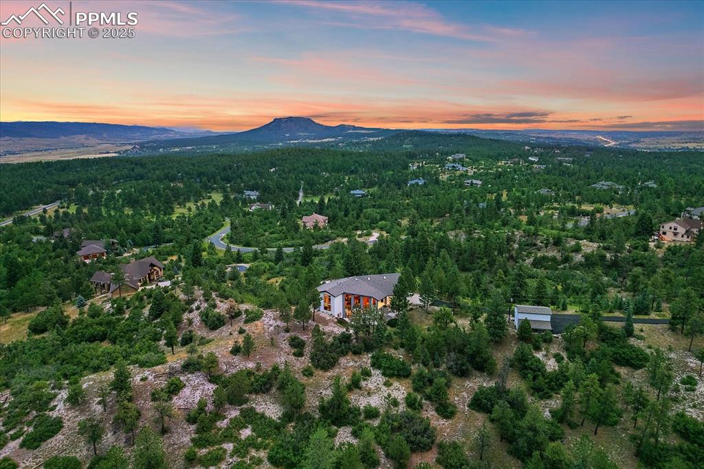 8045 Eagle Road Larkspur, CO 80118 - Photo 42 of 50 a view of a city with lush green forest
