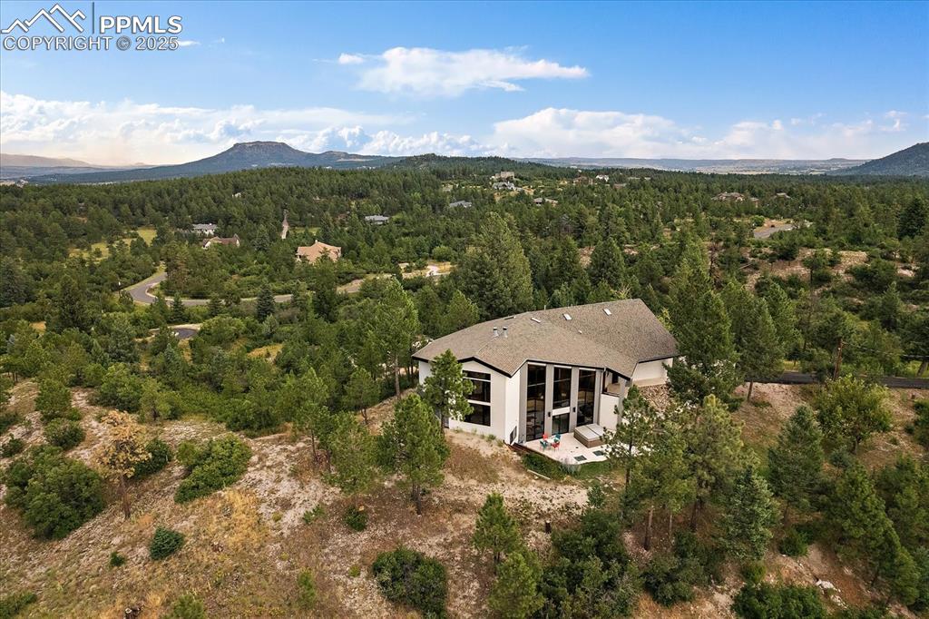 8045 Eagle Road Larkspur, CO 80118 - Photo 48 of 50 a view of a house with a mountain