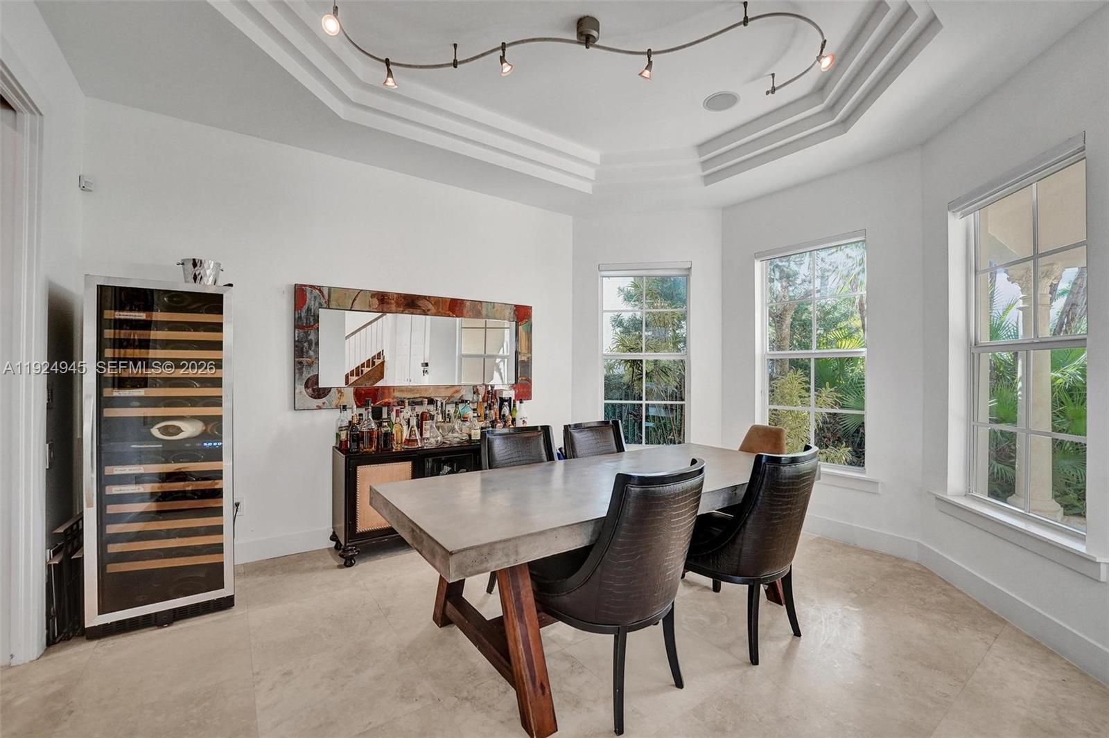 1575 Windjammer Way Hollywood, FL 33019 - Photo 11 of 42 a view of a dining room with furniture window and outside view