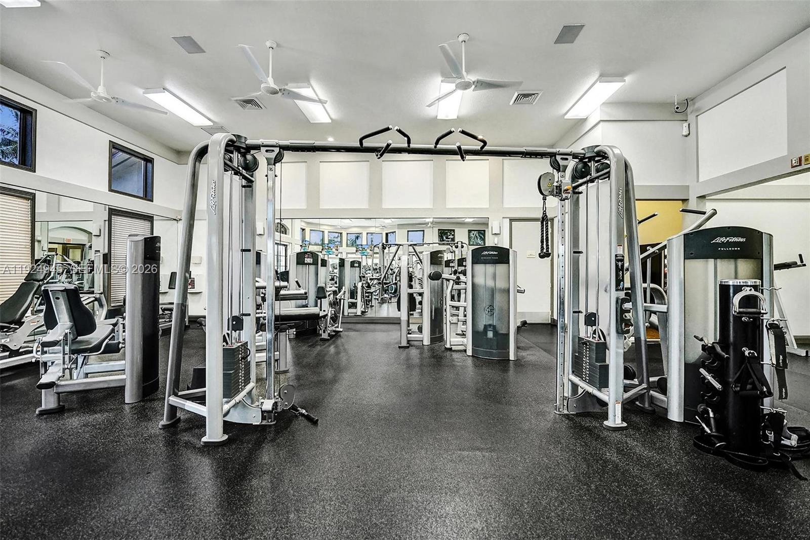 1575 Windjammer Way Hollywood, FL 33019 - Photo 41 of 42 a view of a room with gym equipment