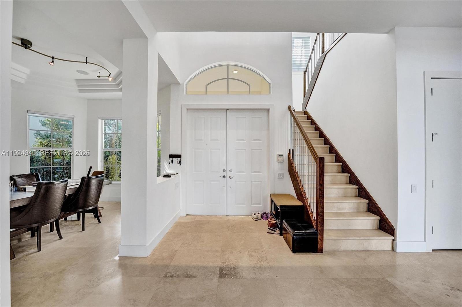 1575 Windjammer Way Hollywood, FL 33019 - Photo 9 of 42 a view of entryway and hall with wooden floor