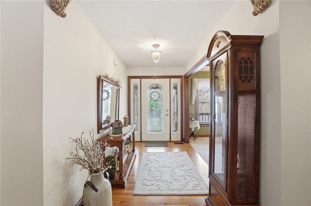 5300 Brookshire Lane Springfield, OH 45502 - Photo 6 of 56 This inviting entryway features elegant hardwood flooring and a stylish decorative glass front door.