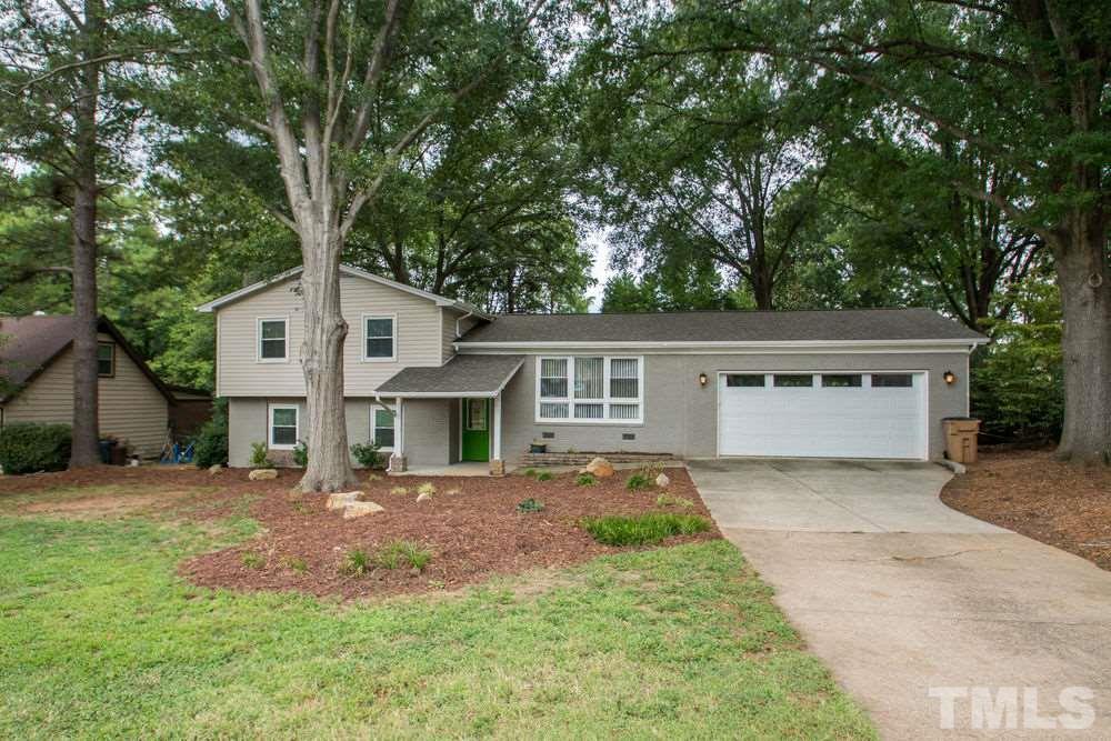 708 Merwin Road Raleigh, NC 27606 - Photo 3 of 25 front view of a house with a yard