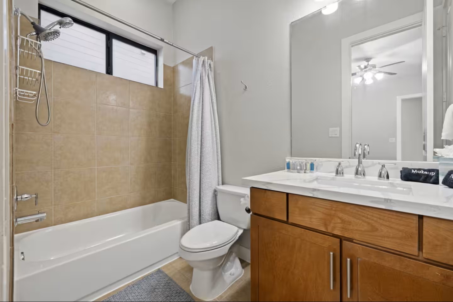 1205 Detering Street Houston, TX 77007 - Photo 26 of 30 a bathroom with a sink a toilet and shower