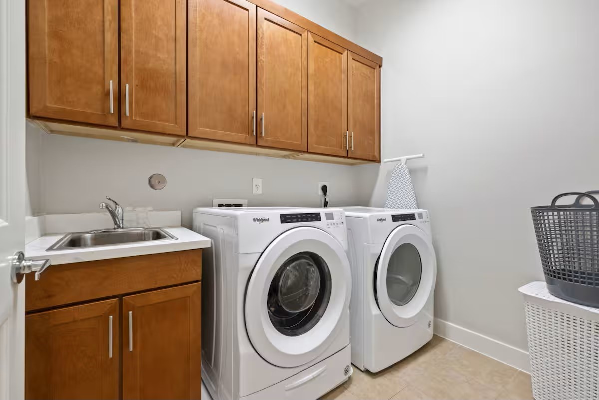 1205 Detering Street Houston, TX 77007 - Photo 27 of 30 a utility room with dryer and washer