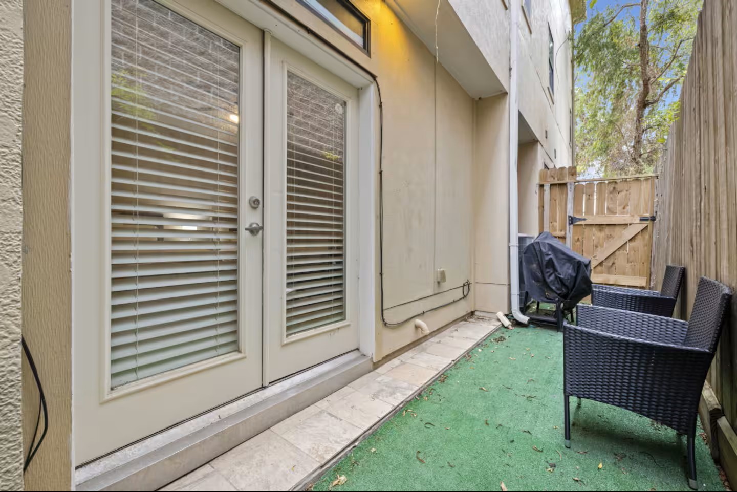 1205 Detering Street Houston, TX 77007 - Photo 29 of 30 a view of backyard with furniture and a gate