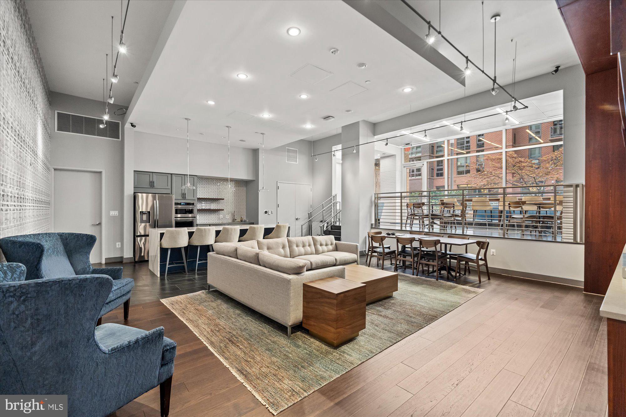 1025 First Street Southeast, Unit 511 Washington, DC 20003 - Photo 18 of 25 a living room with furniture and a large window