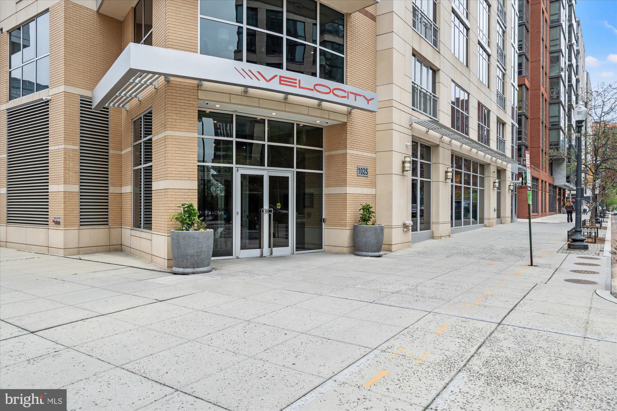 1025 First Street Southeast, Unit 511 Washington, DC 20003 - Photo 22 of 25 a view of a building with a bench