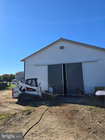 a front view of a house with patio