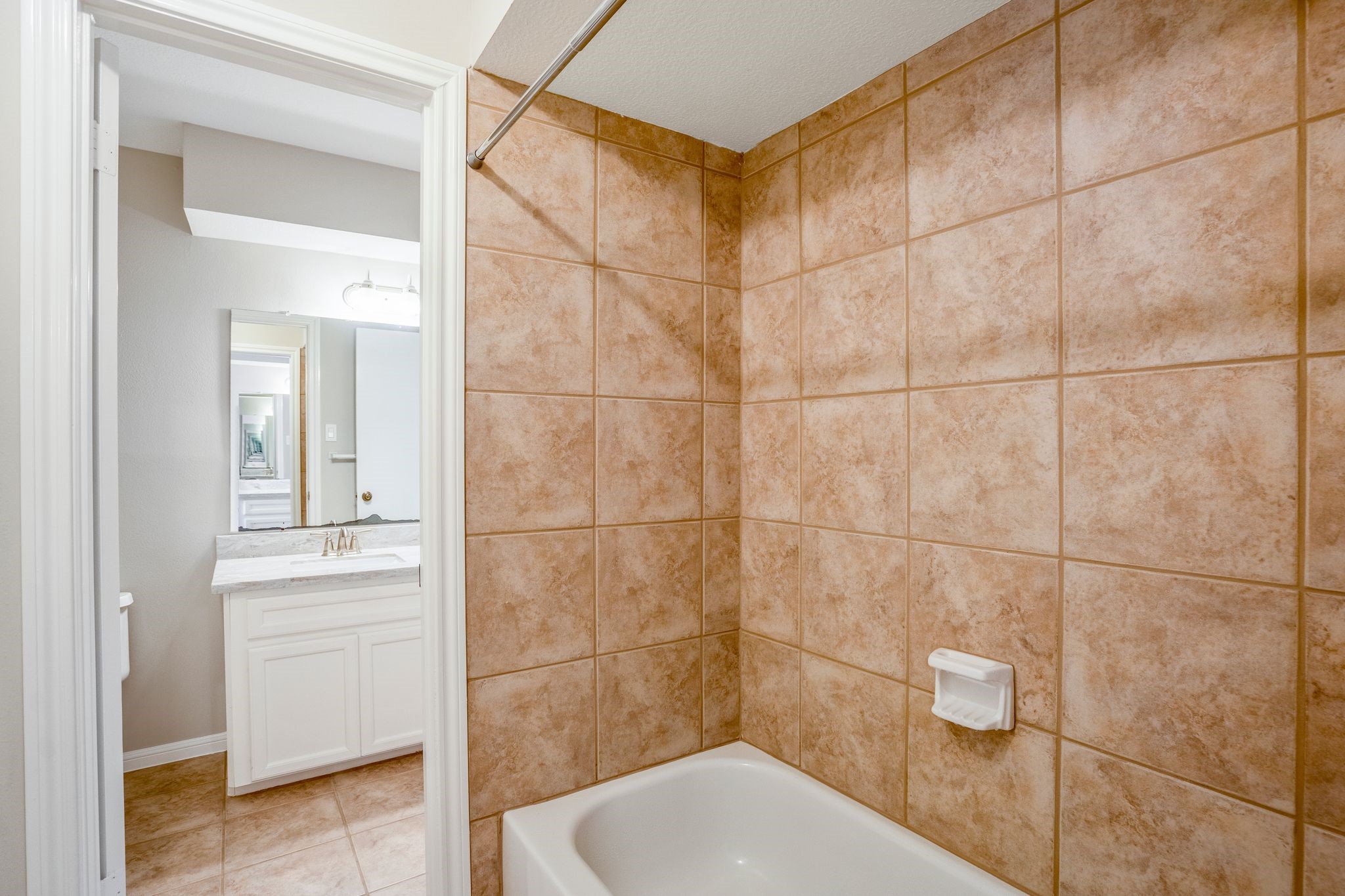 7607 Wycomb Lane Houston, TX 77070 - Photo 30 of 38 a bathroom with a toilet and a shower