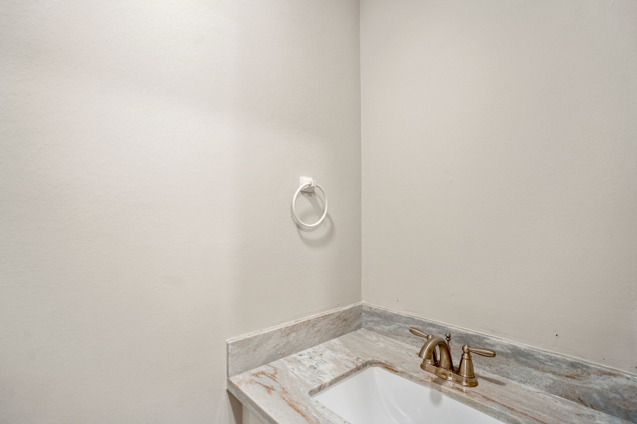 7607 Wycomb Lane Houston, TX 77070 - Photo 36 of 38 a bathroom with a sink and vanity
