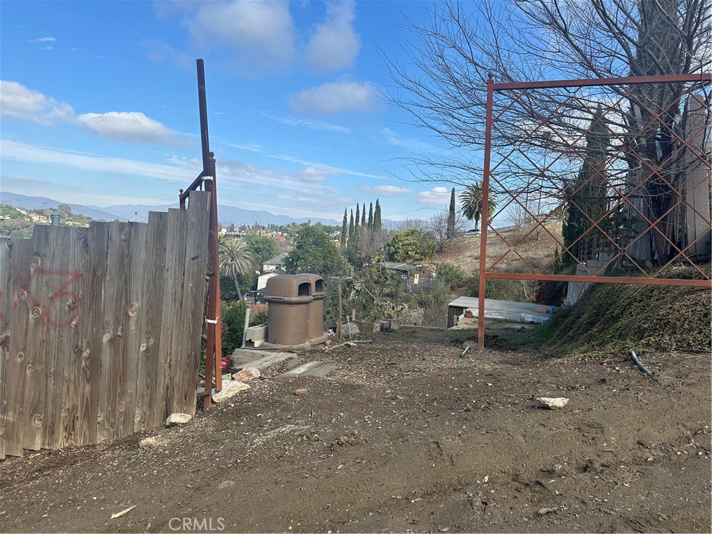 a view of a terrace with a table and chairs