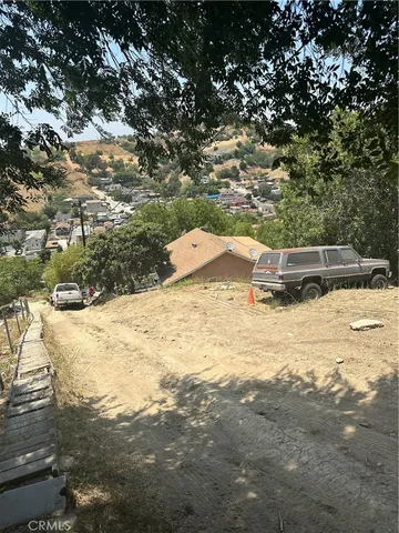 a view of a yard with an outdoor space