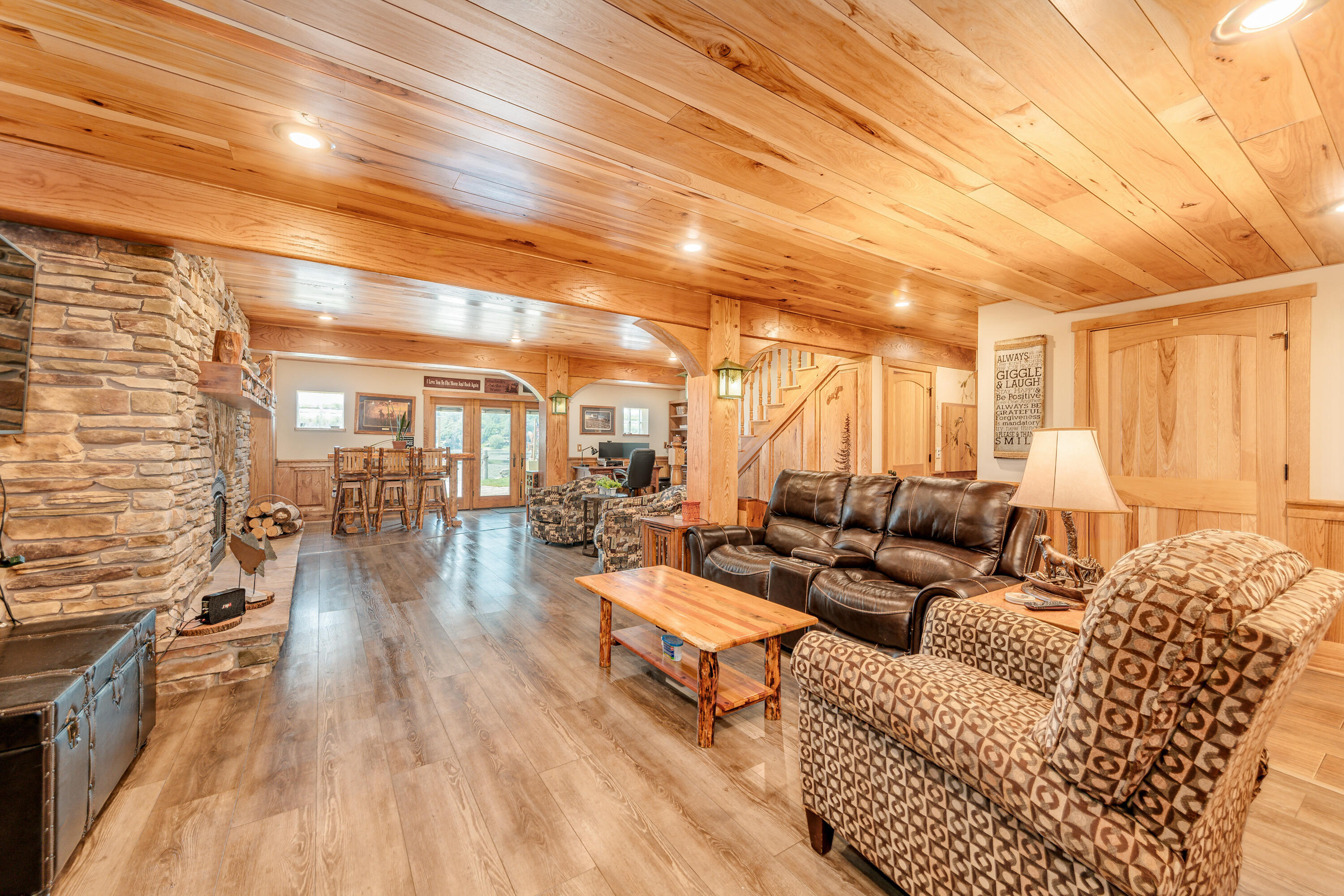 5420 West Peninsula Road Waterford, WI 53185 - Photo 32 of 65 Hickory ceiling with gorgeous oak millwork and beams.