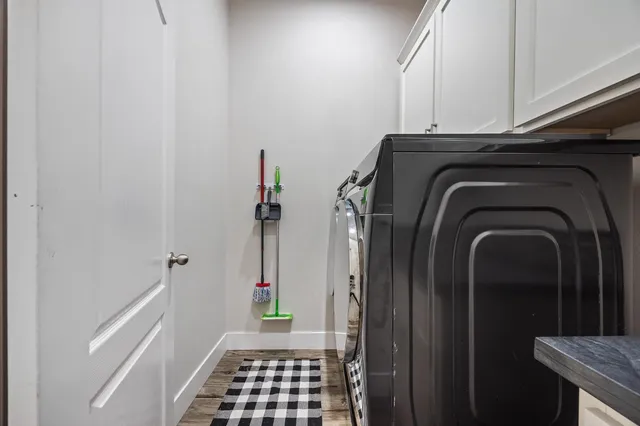 a view of a room with wooden walls